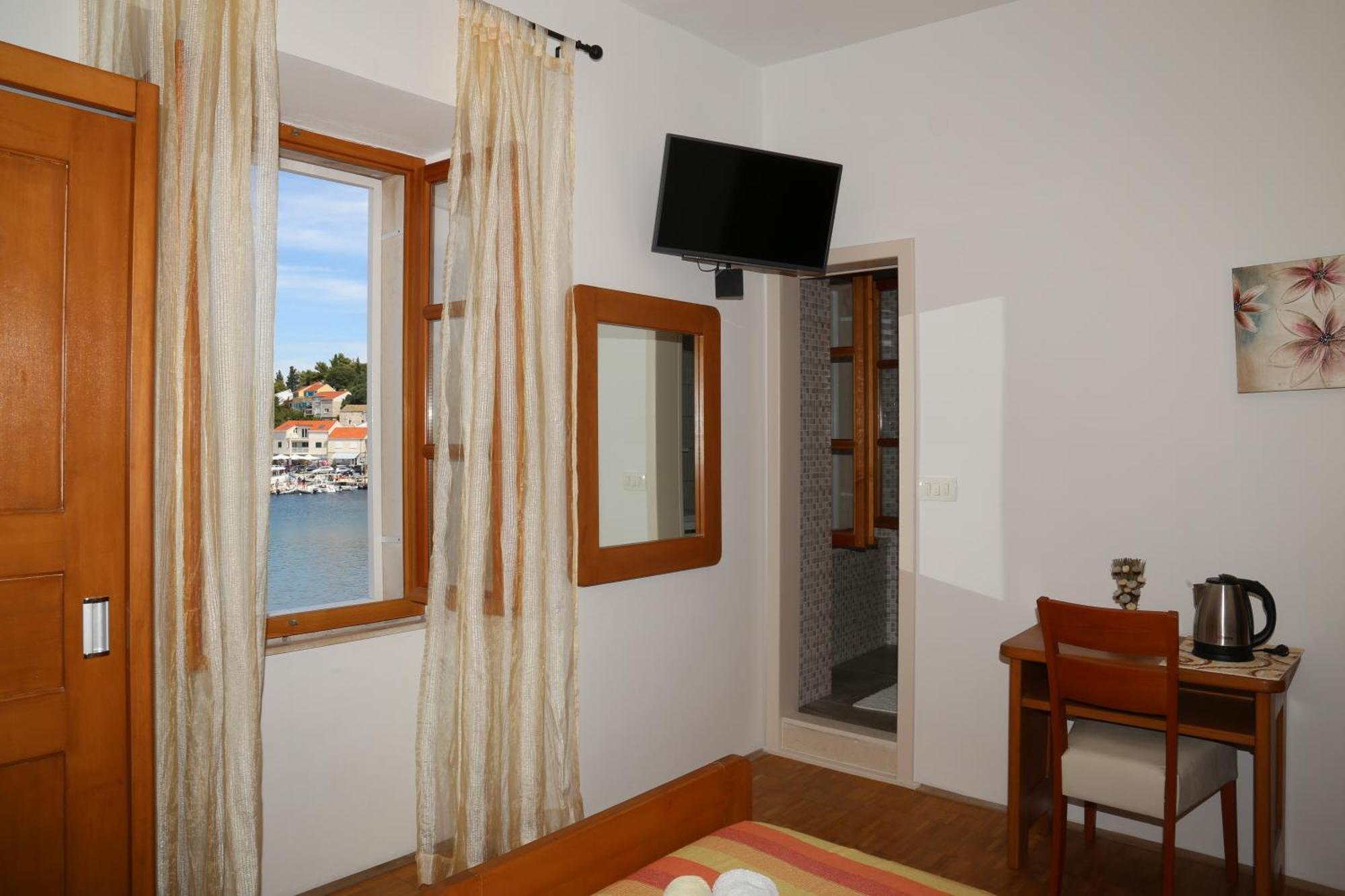 Coosy Rooms Katarina Lumbarda Szoba fotó