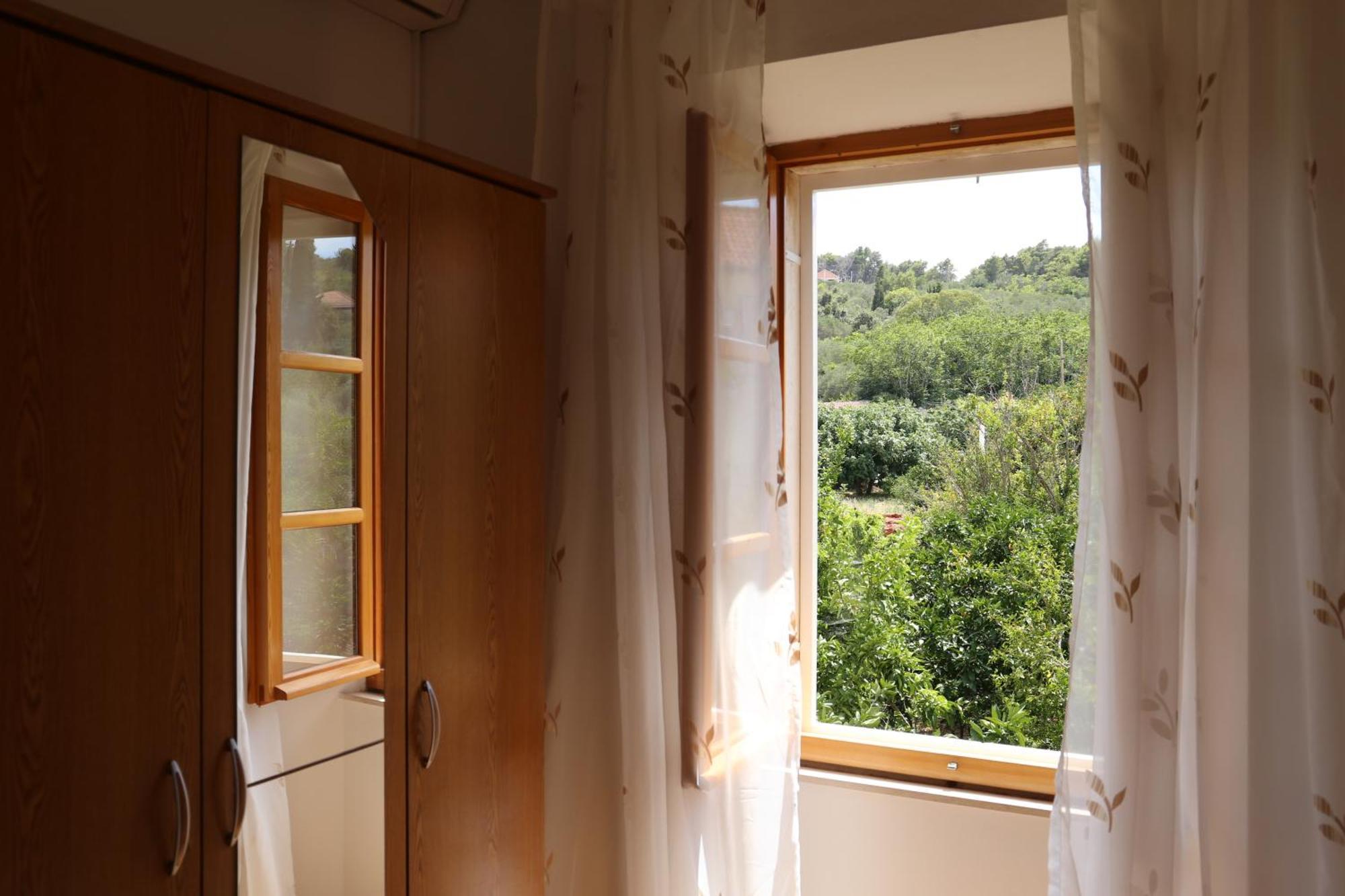 Coosy Rooms Katarina Lumbarda Szoba fotó